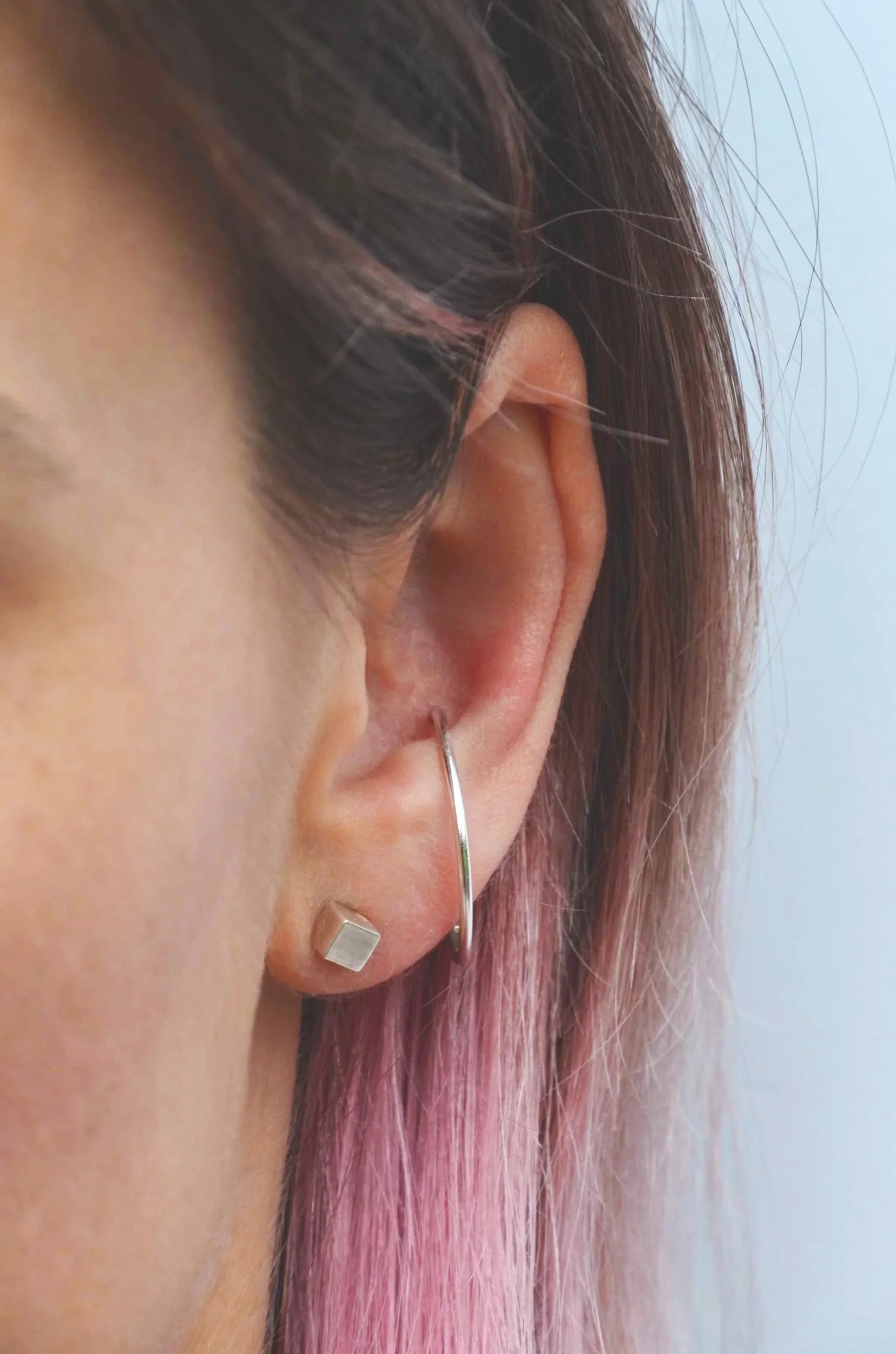 oversize-hoop-for-conch-piercing-on-model-by-victoria-grace-silversmith.jpg