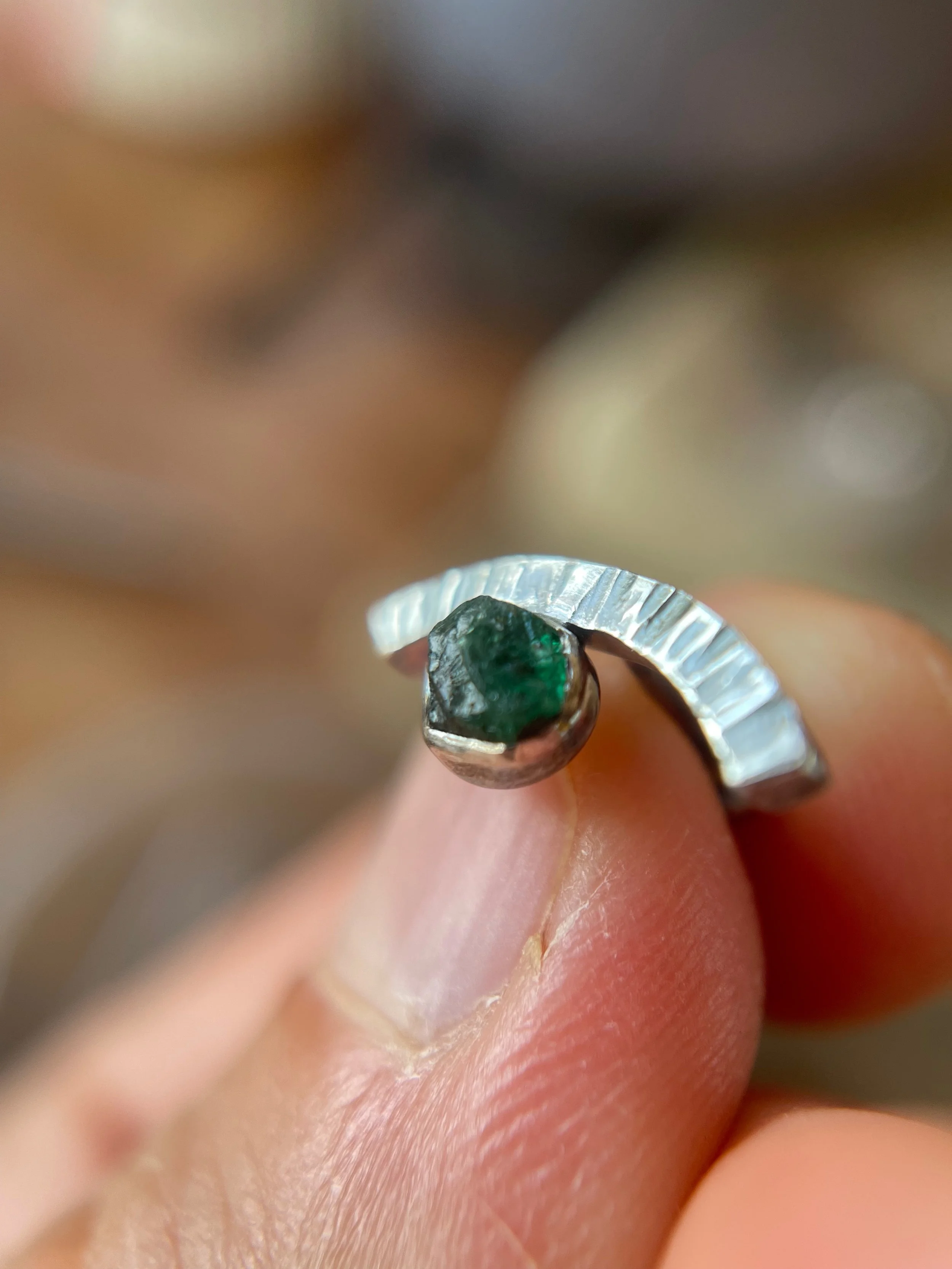 Raw emerald antiqued conch earring