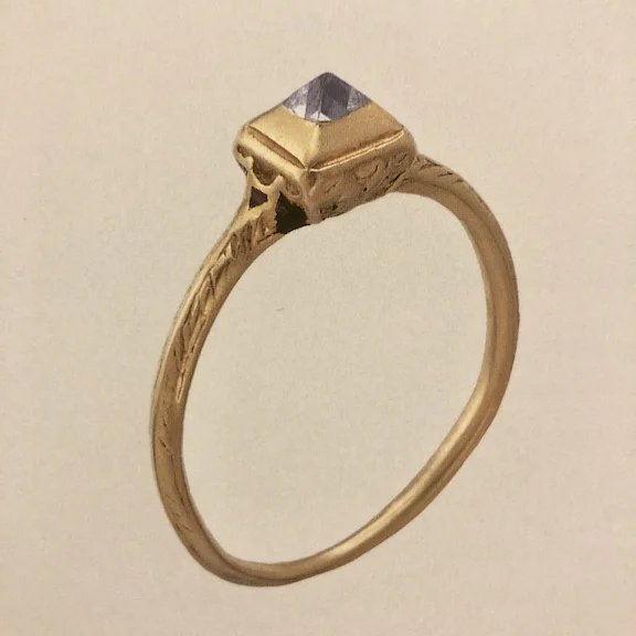 A gold ring set with a point-cut diamond in a box bezel, c. 1600.