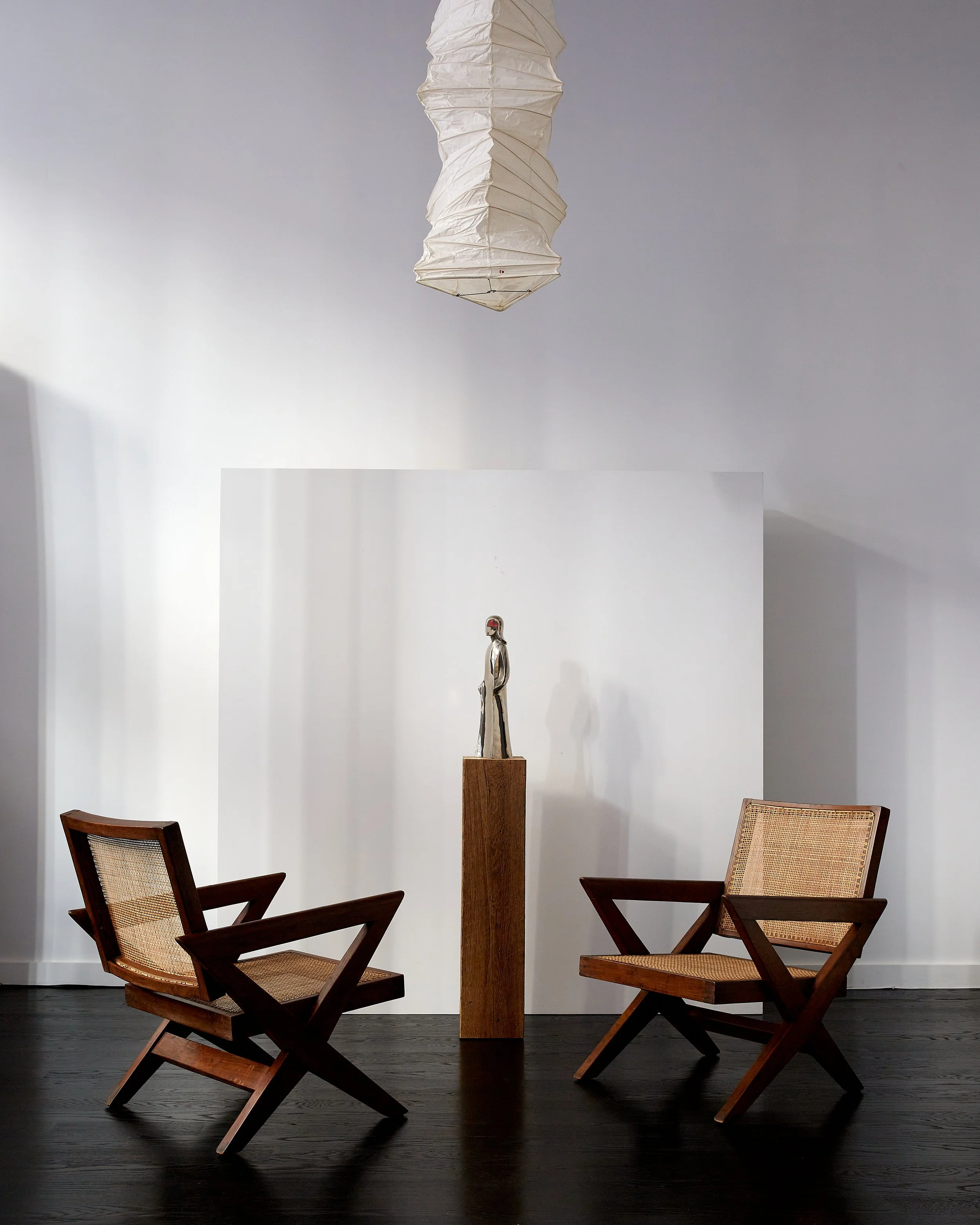 pair_pierre_jeanneret_x_leg_caned_armchairs.jpg
