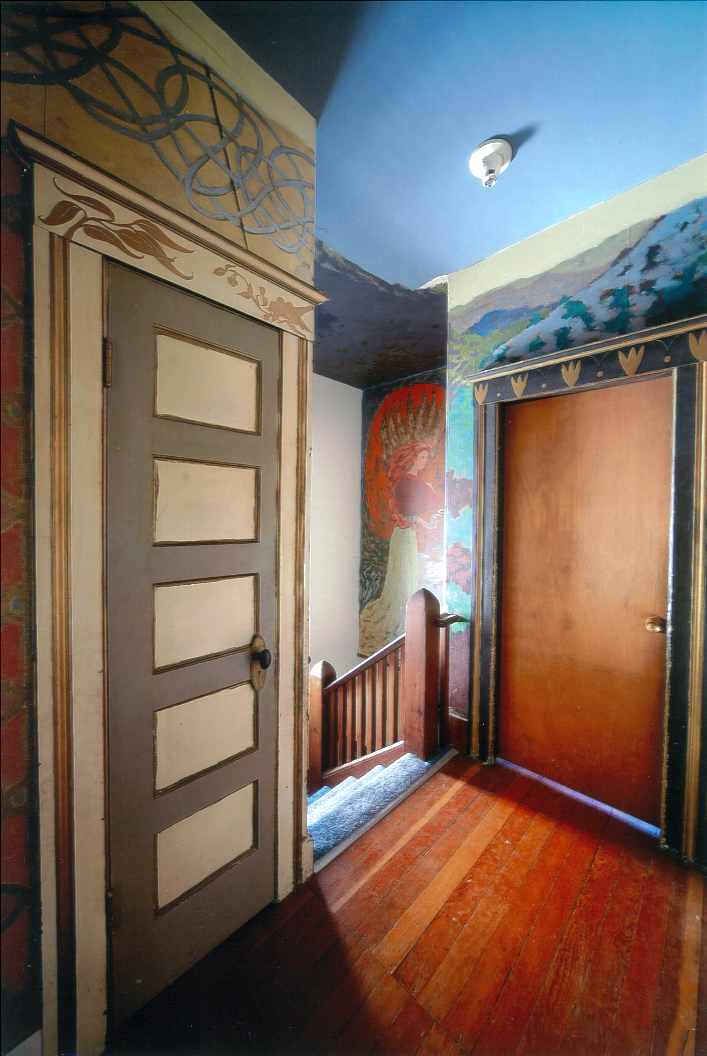 Jess hallway mural continued, picturing Celtic and medieval designs on the top left referencing an interest of Kael .