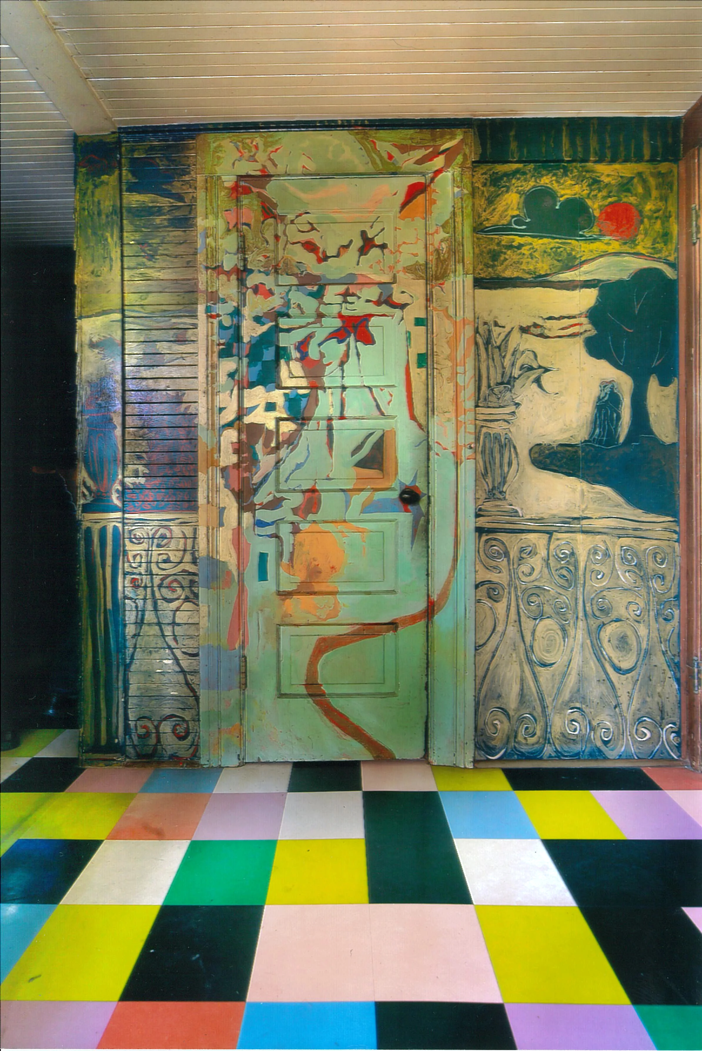 Jess and Harry Jacobus collaboration in the Laundry room. You can see lovers by a tree on the right, and the image on the door leaves an interpretation to yet be discovered. 