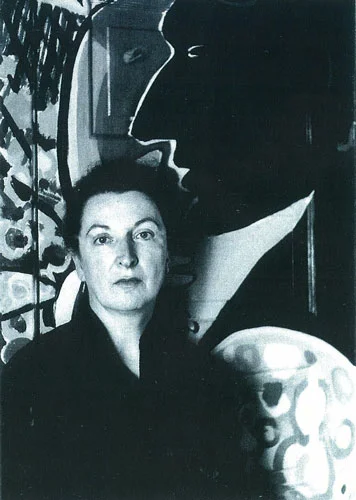 Pauline Kael in front of one of the house murals by Jess that will be unconvered, c. 1960