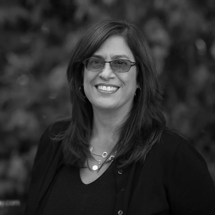 AIMEE TRIANA-ALVAREZ Aimee is principal designer at AMT Design , a firm providing design services to the Northwest Region. As our teammate, Aimee is involved in deciding the interior appointments for residential and commercial projects. She leads the research and selection process to determine interior materials, furnishings, and lighting fixtures commensurate with each project's circumstances, with an eye to providing cost effective choices for our clients.