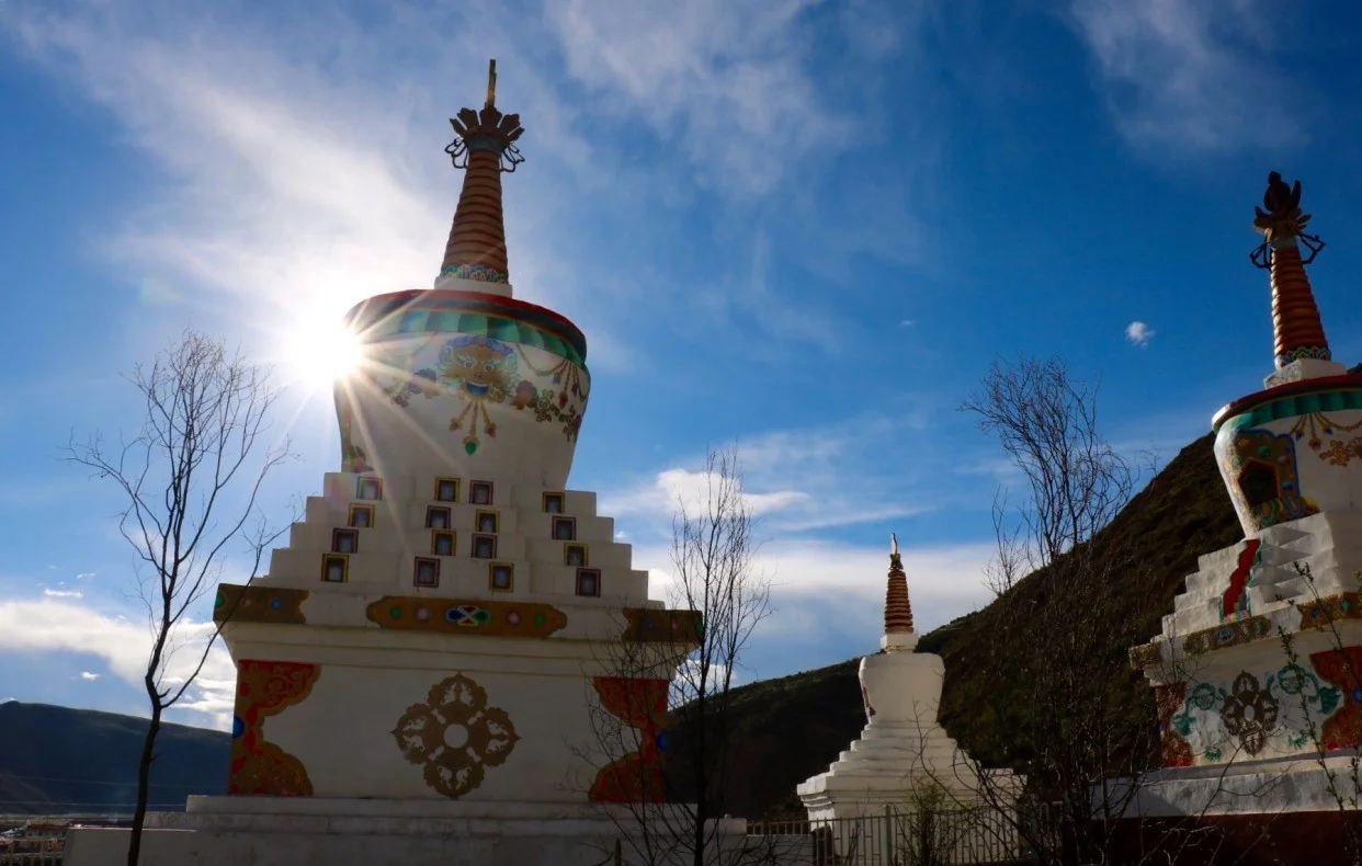 Stupas on the road.jpg