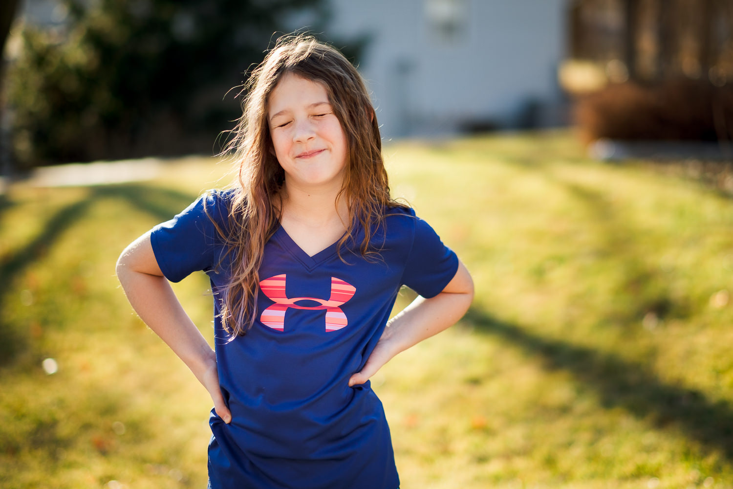 eight year old girl with long hair outdoors in Lincoln, Nebraska