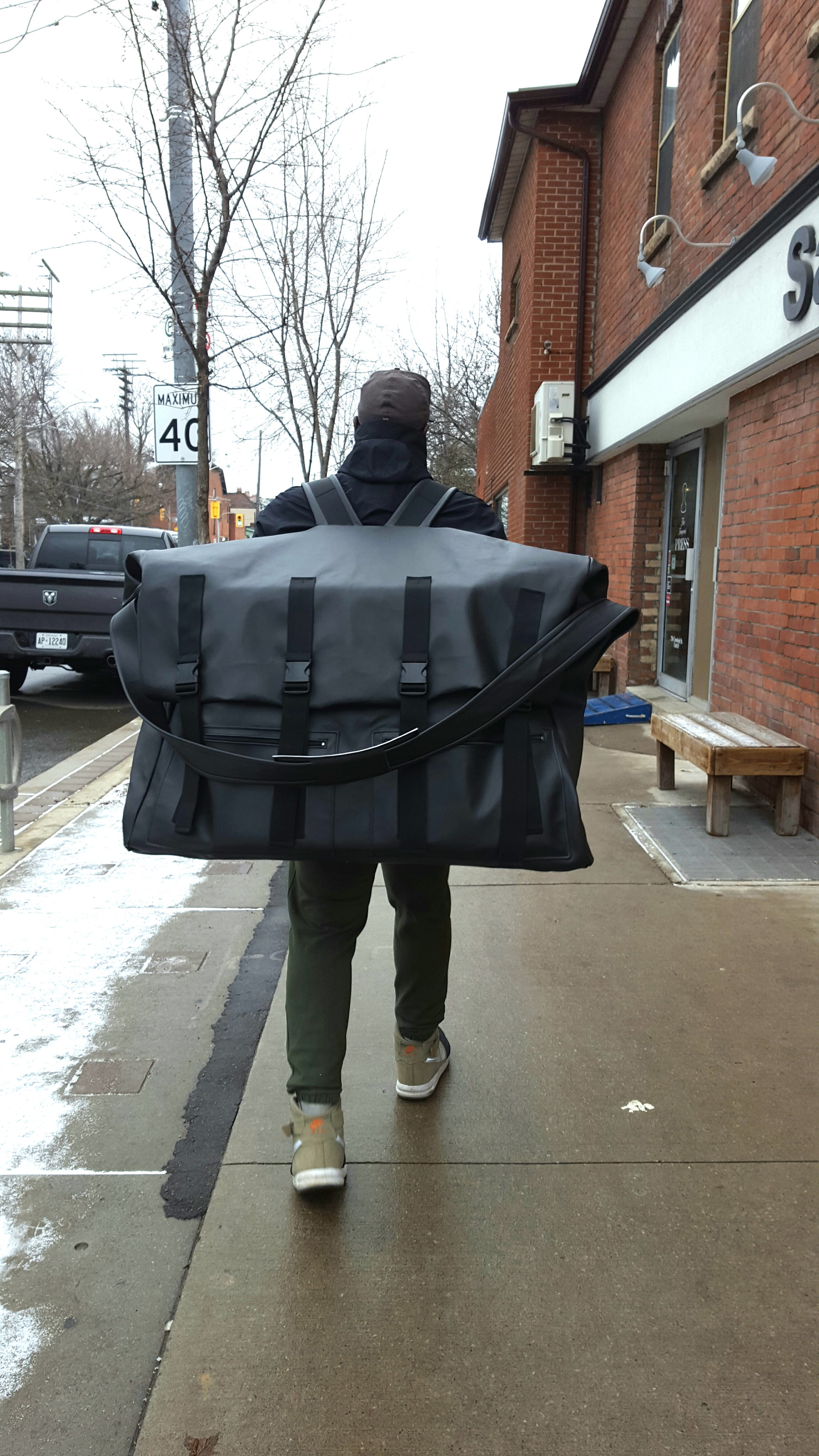 Padded Mega Black Vinyl Backpack with Over-The-Shoulder Strap Option