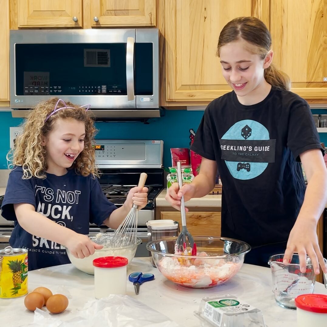 I gave the girls a creative challenge: jazz up a box of basic white cake mix and vanilla frosting, your way! I threw everything we had in the pantry on the counter and let them create their own masterpieces. It&rsquo;s part baking, part art project, 