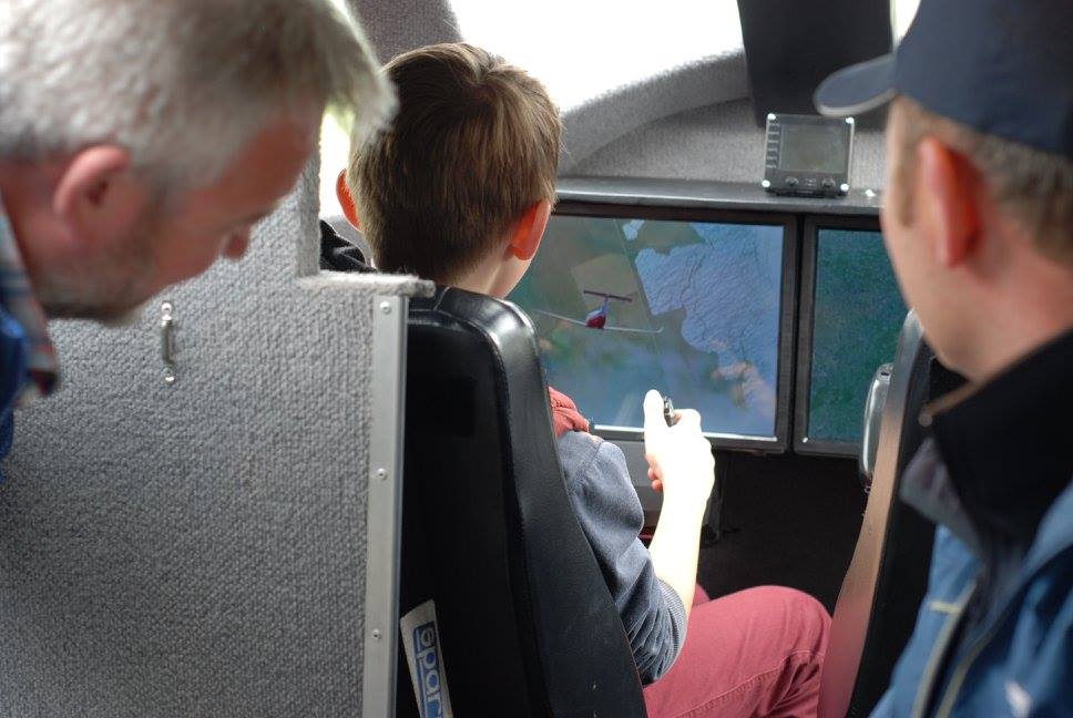 An eager trainee pilot tests his skills flying a rescue mission in the simulator