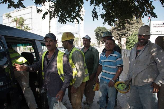 Egyptian construction workers to head home after a long working day in Abdoun, Amman. Photo: Jihad Abaza