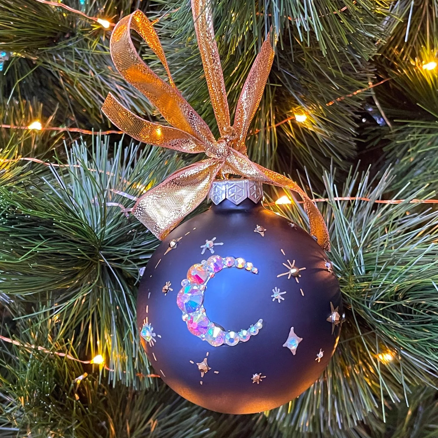 Hand Painted Moon and Stars Christmas Bauble by Marcella Wylie.jpg