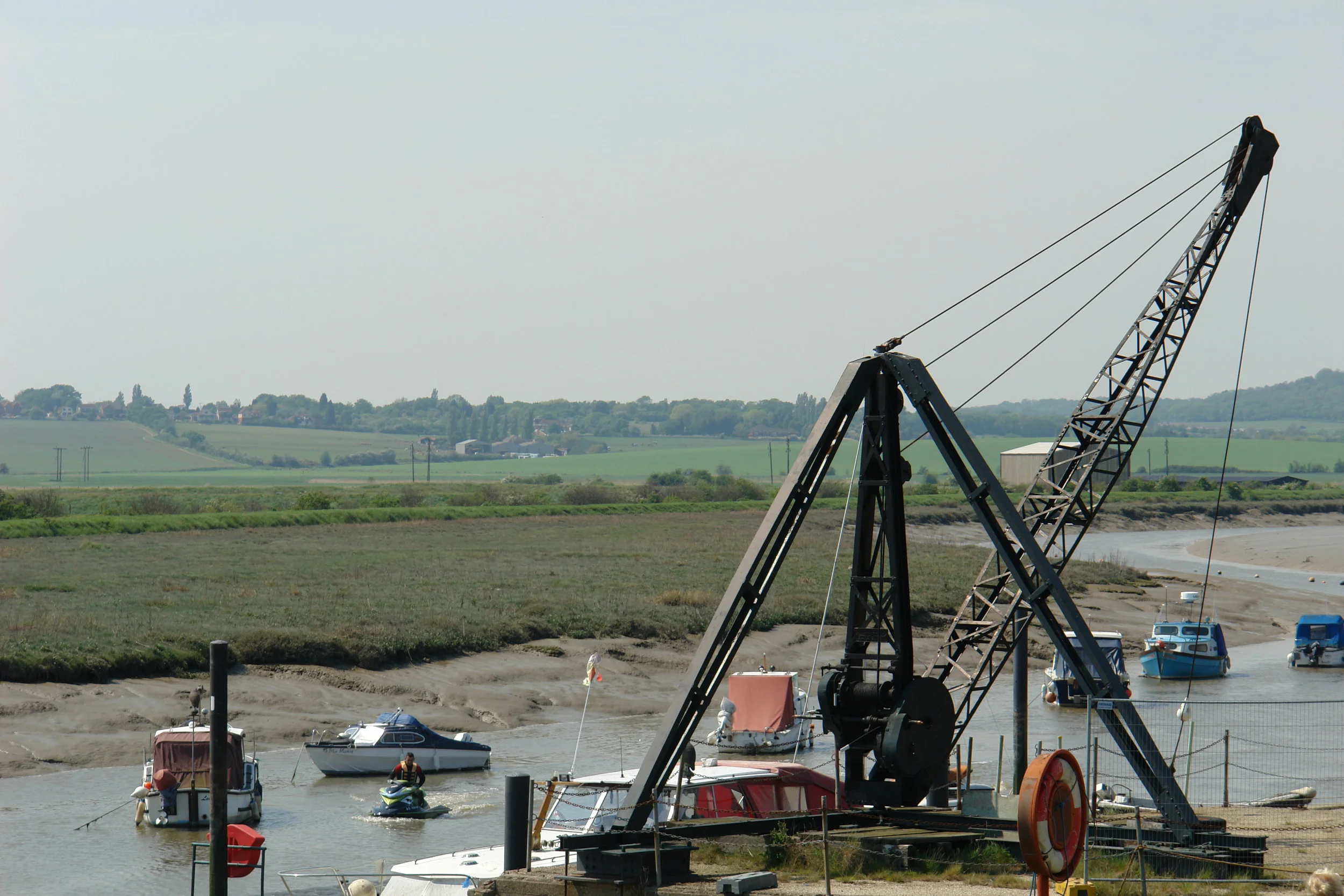 The atmospheric Wat Tyler Marina stands on the site of the goods wharf of the Pitsea Explosives Factory. The crane is a surviving relic.