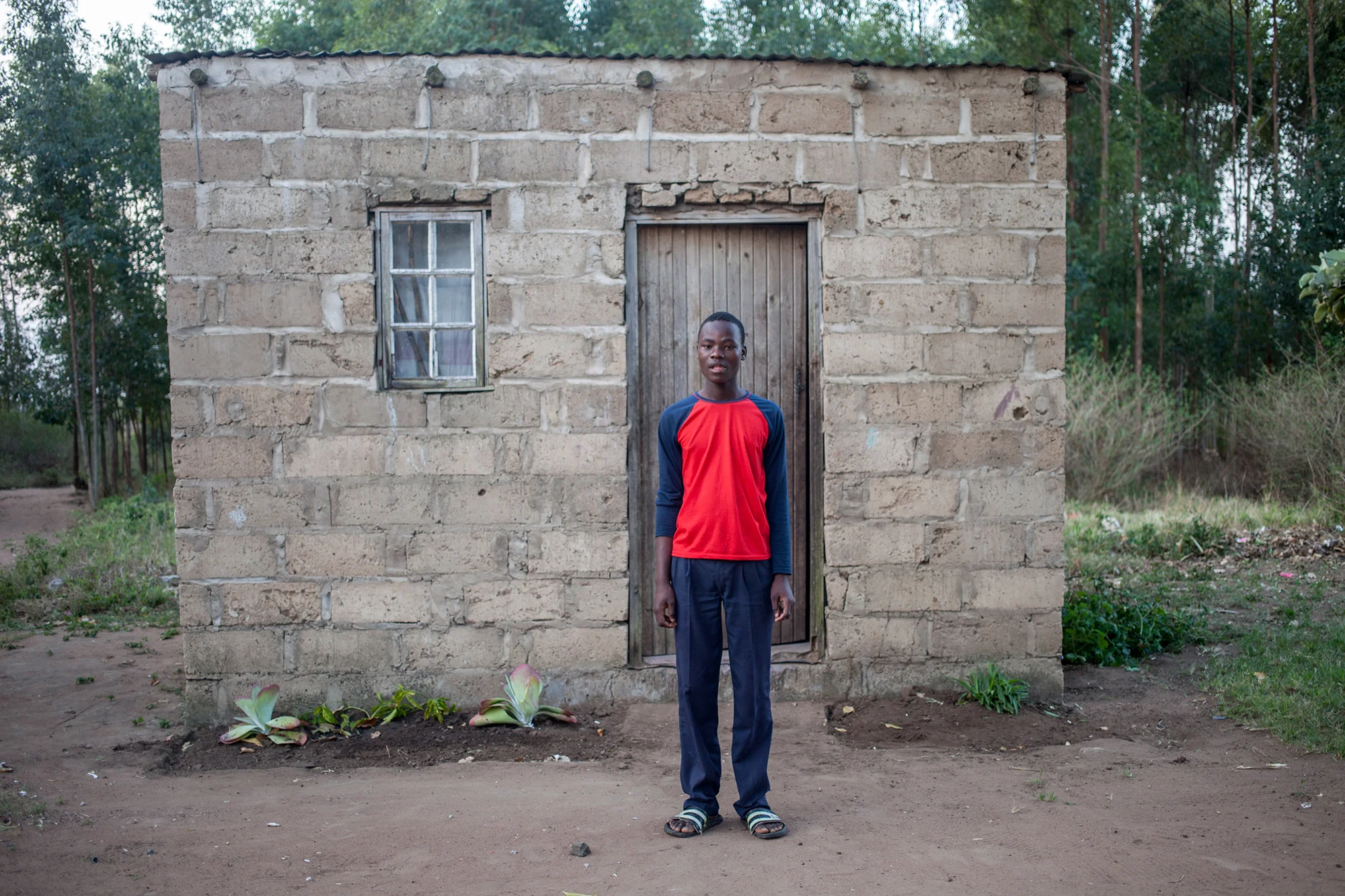 Young boy pose outside his house in KwaZulu Natal.2014.jpg