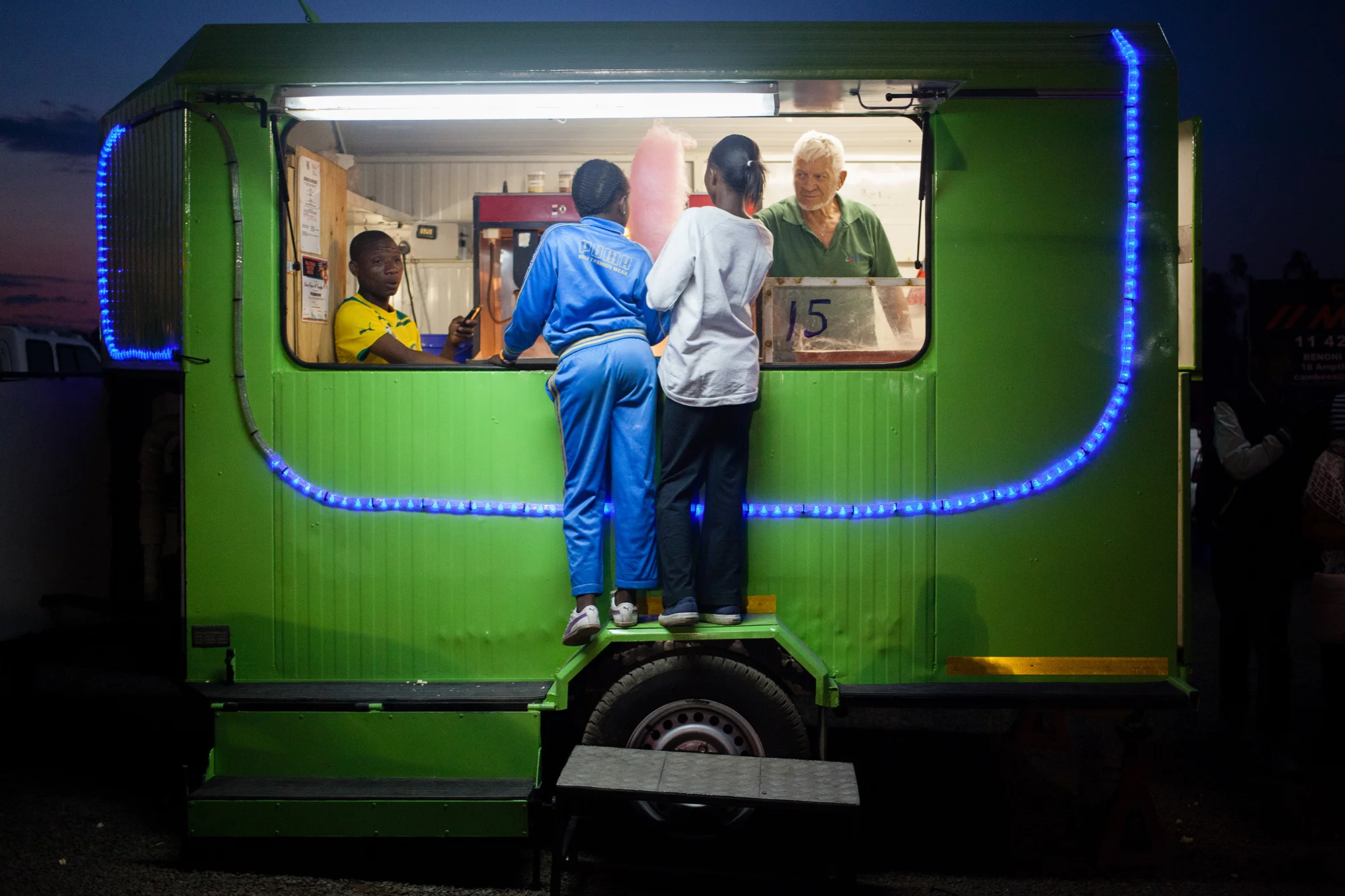 Young girls buying candy in Benoni during Car drifting event. 2014.jpg