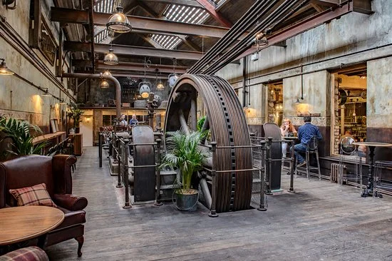 HOLMES MILL FEATURES OVER 40 BEERS AND SEVERAL ROOMS TO RELAX