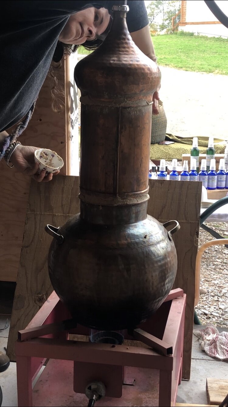 Putting on the Rye flower to seal the still