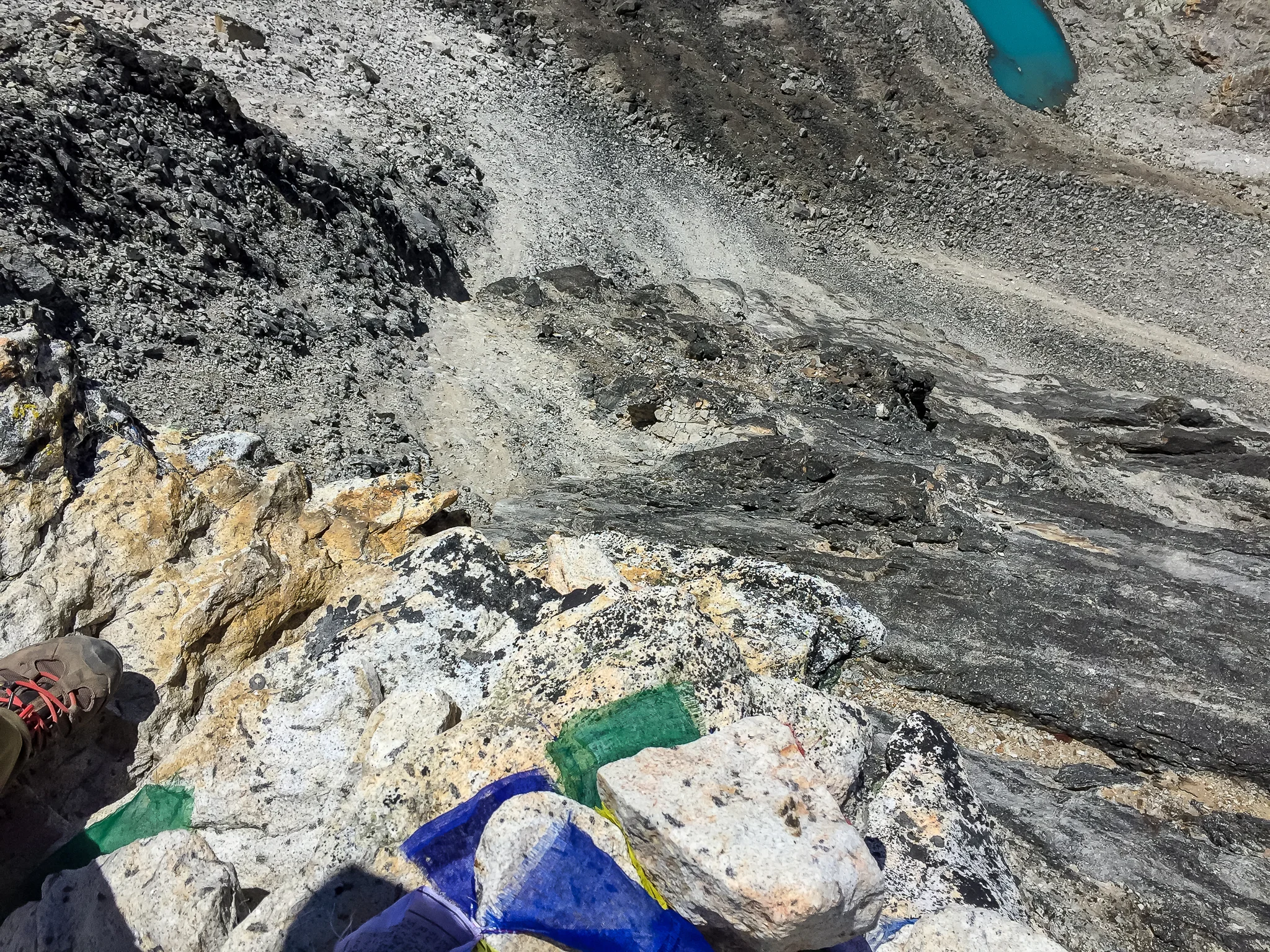 It was tricky to capture how it's a sheer drop off for probably a hundred meters at the very top point of Kalapathar.