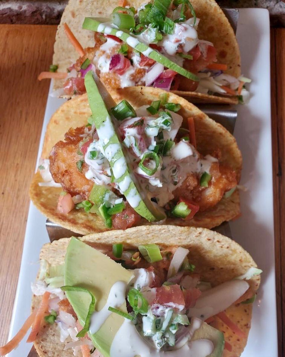 Fried fish tacos were made for the  summer time! These warm yellow tortillas are filled with crispy fried haddock, jalape&ntilde;o coleslaw, pico de gallo &amp; green goddess dressing.

Try one of our cold beers or a passion margarita to accompany th