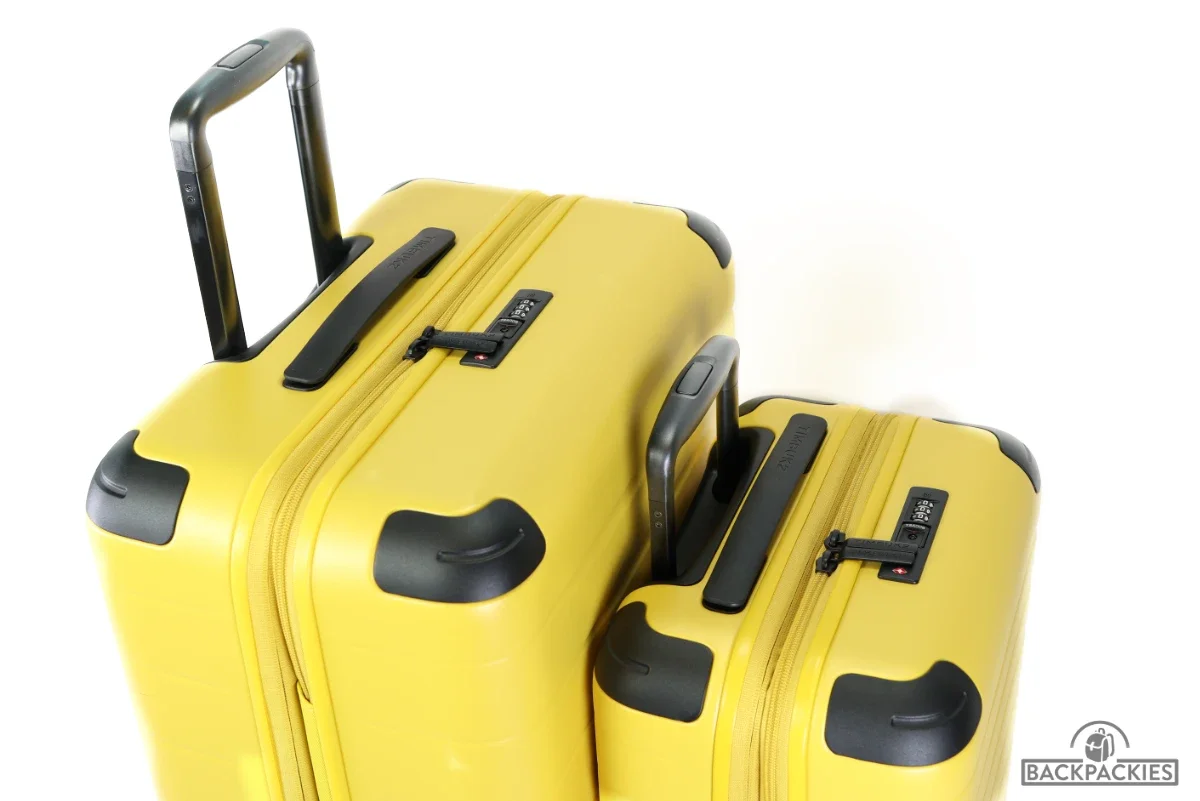 Timbuk2 FreeStyle luggage top view showing TSA lock placement and polycarbonate corner bumpers