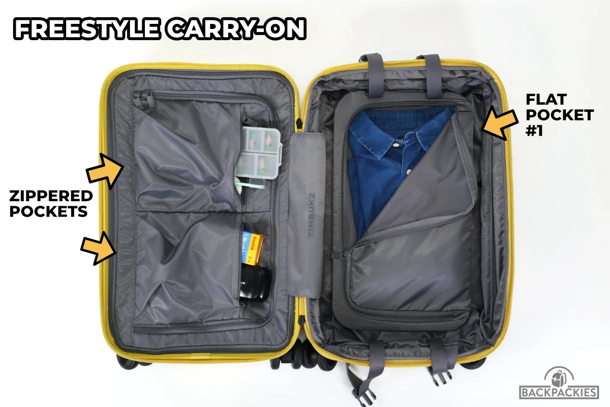 Timbuk2 FreeStyle carry-on interior pockets showing two zippered pockets and flat compression board pocket