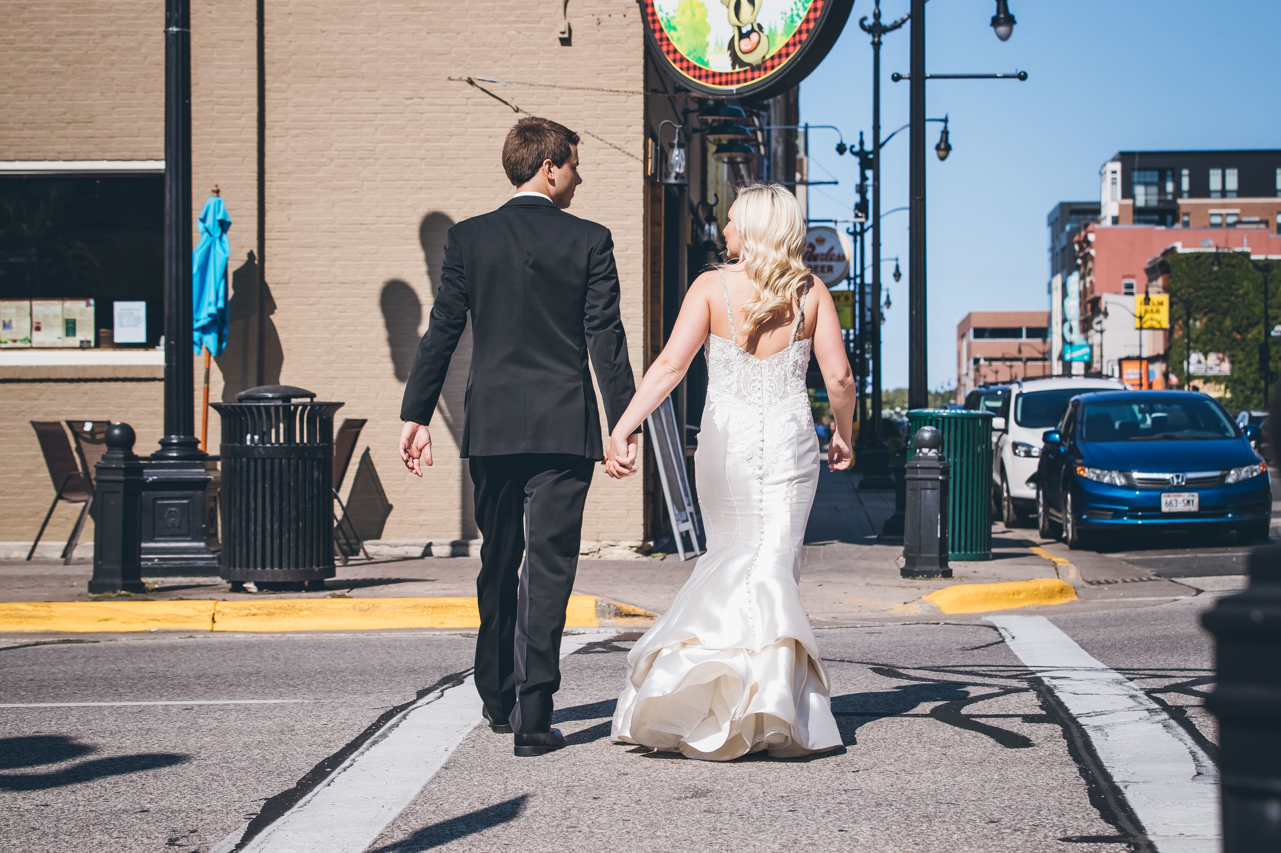 La Crosse, WI Wedding Photographers. La Crosse Bridge. Waterfront Wedding. cathedral wedding.