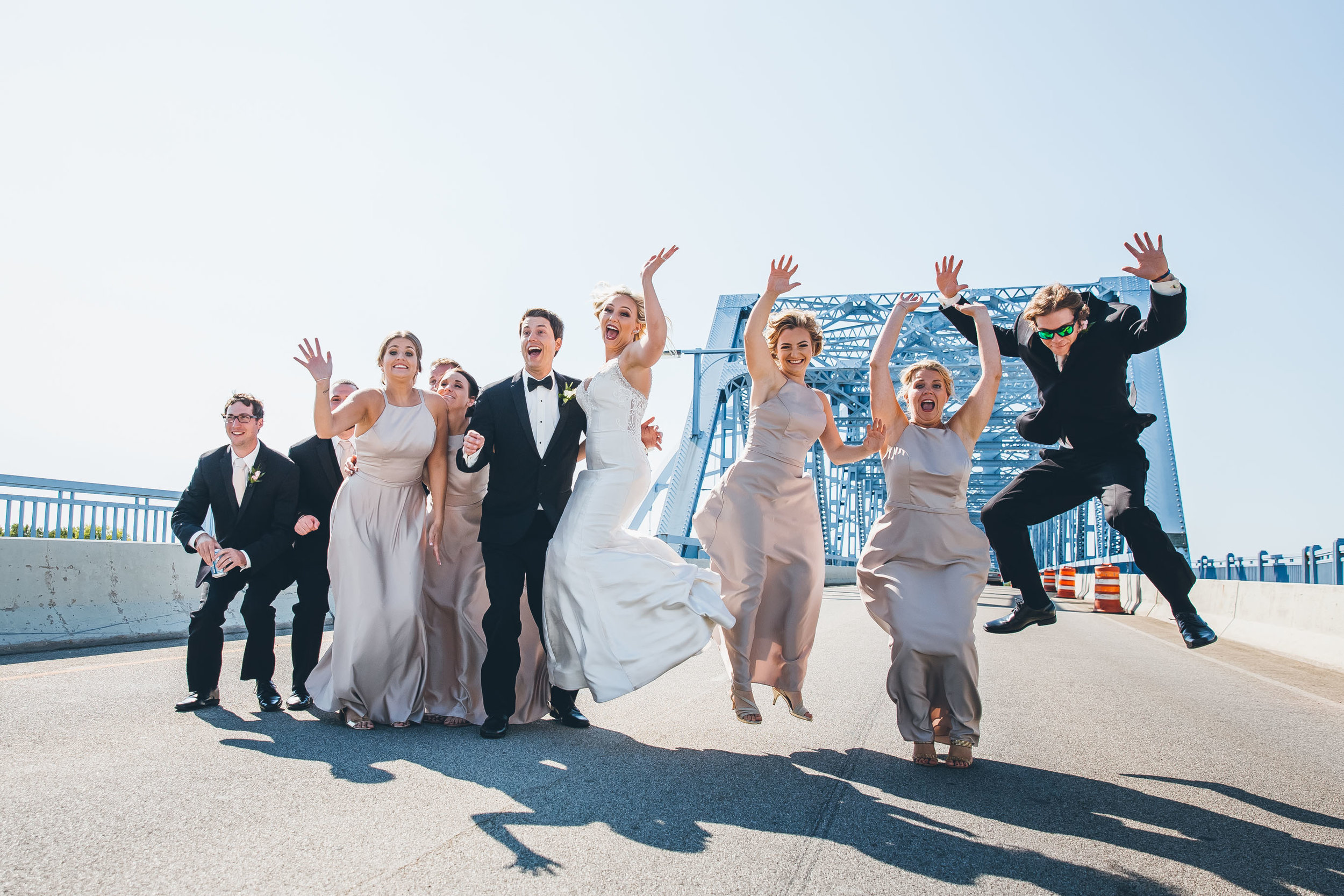 La Crosse, WI Wedding Photographers. La Crosse Bridge. Waterfront Wedding. cathedral wedding.