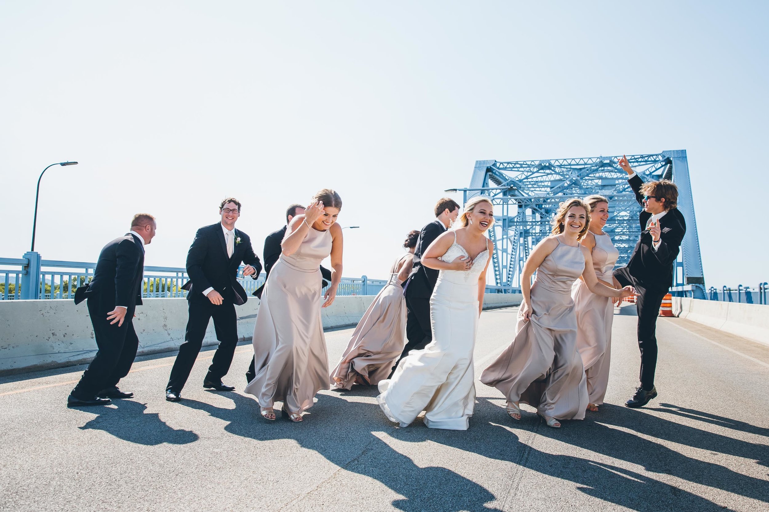 La Crosse, WI Wedding Photographers. La Crosse Bridge. Waterfront Wedding. cathedral wedding.