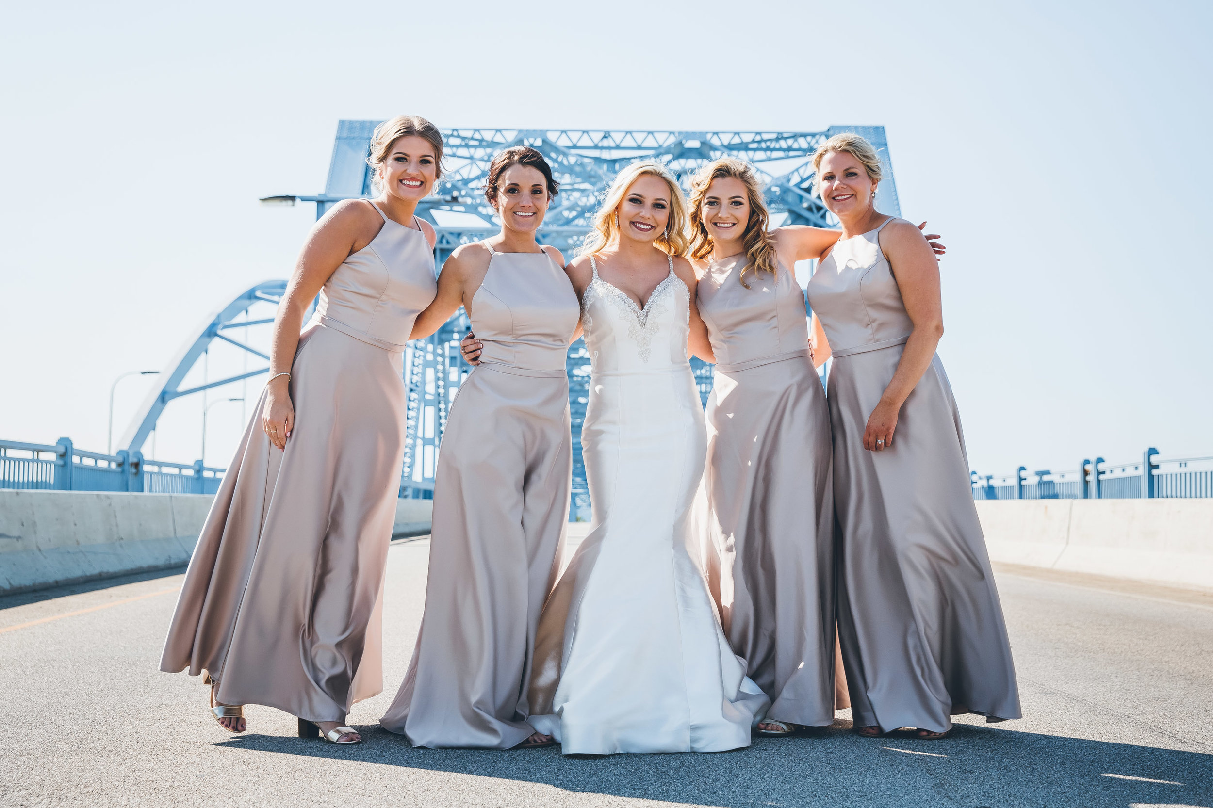 La Crosse, WI Wedding Photographers. La Crosse Bridge. Waterfront Wedding. cathedral wedding.