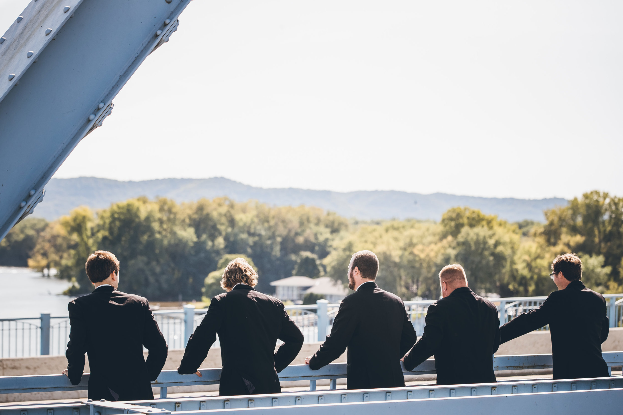 La Crosse, WI Wedding Photographers. La Crosse Bridge. Waterfront Wedding. cathedral wedding.