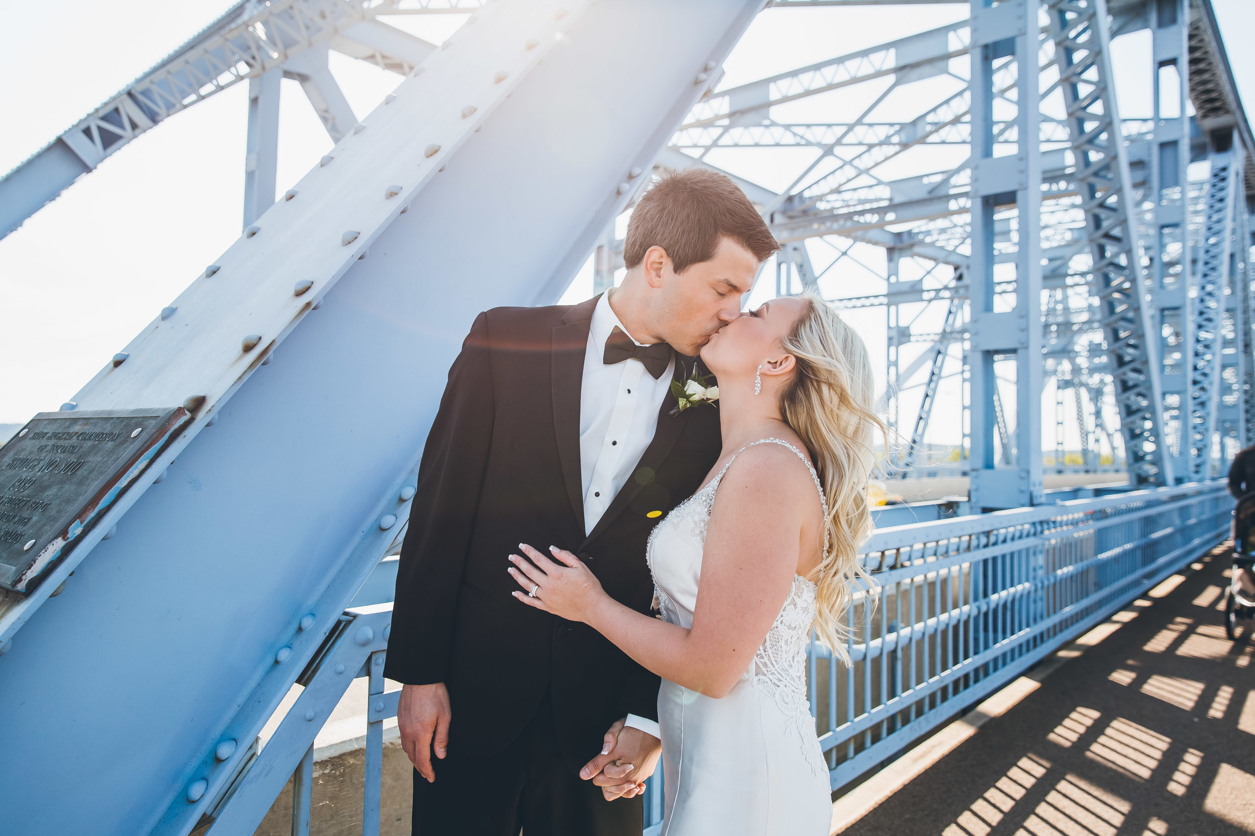 Cass street bridge la crosseLa Crosse, WI Wedding Photographers. La Crosse Bridge. Waterfront Wedding. cathedral wedding.