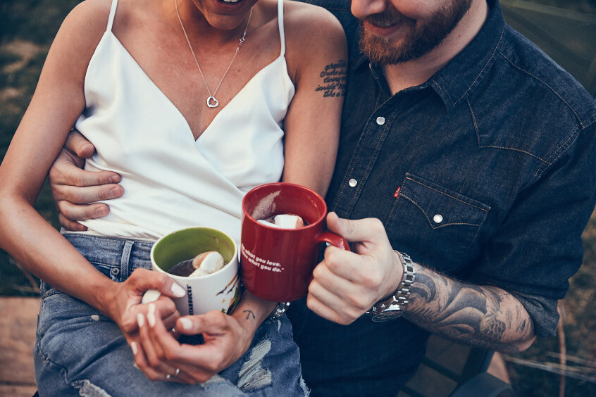 Couple Drinking Mugs