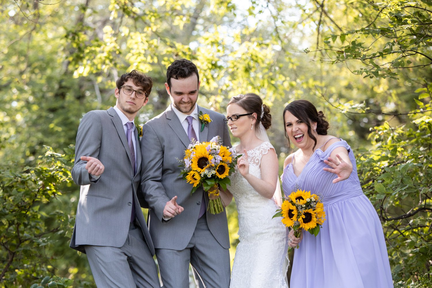 Candid wedding party photos with sunflowers  in Colorado by CliftonMarie Photography