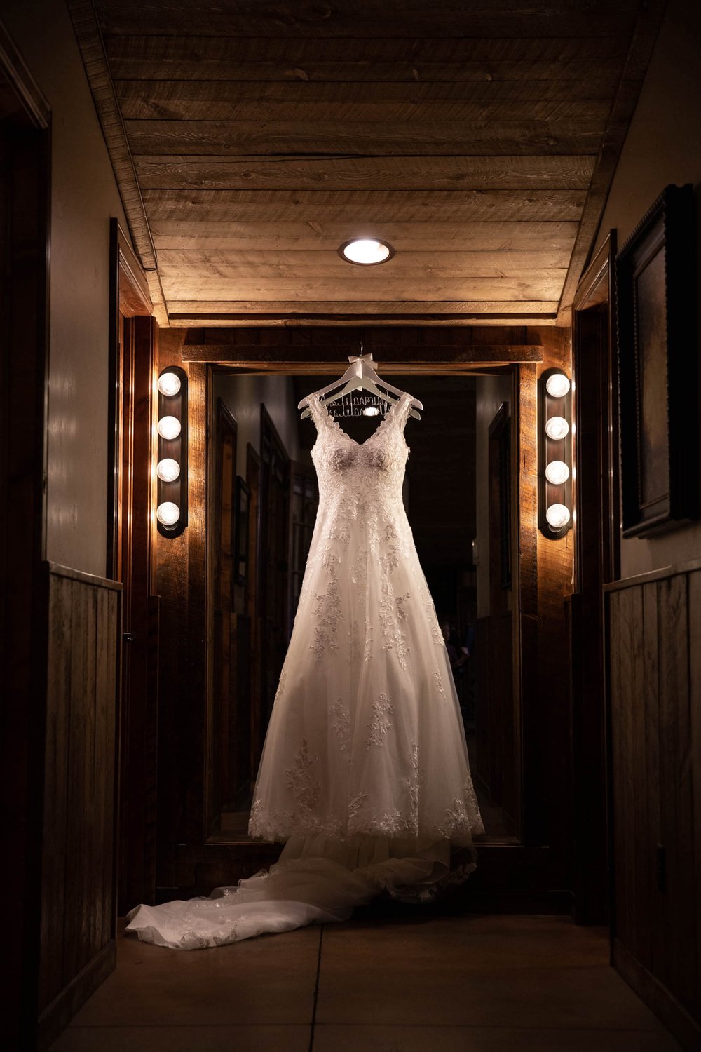 Bride's dress hanging at Spruce Mountain Ranch