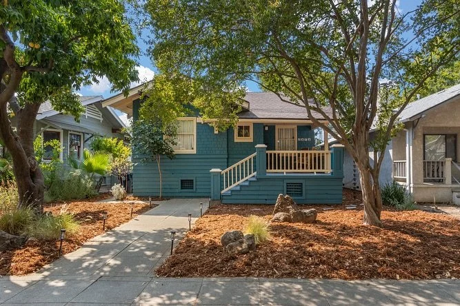 ✨ Just listed in the heart of Med Center! This 1921 Craftsman bungalow is packed with vintage charm, original built-ins, hardwood floors, a dreamy front porch, and a stunning antique range. The backyard is tranquil, shaded by mature trees, with a hot