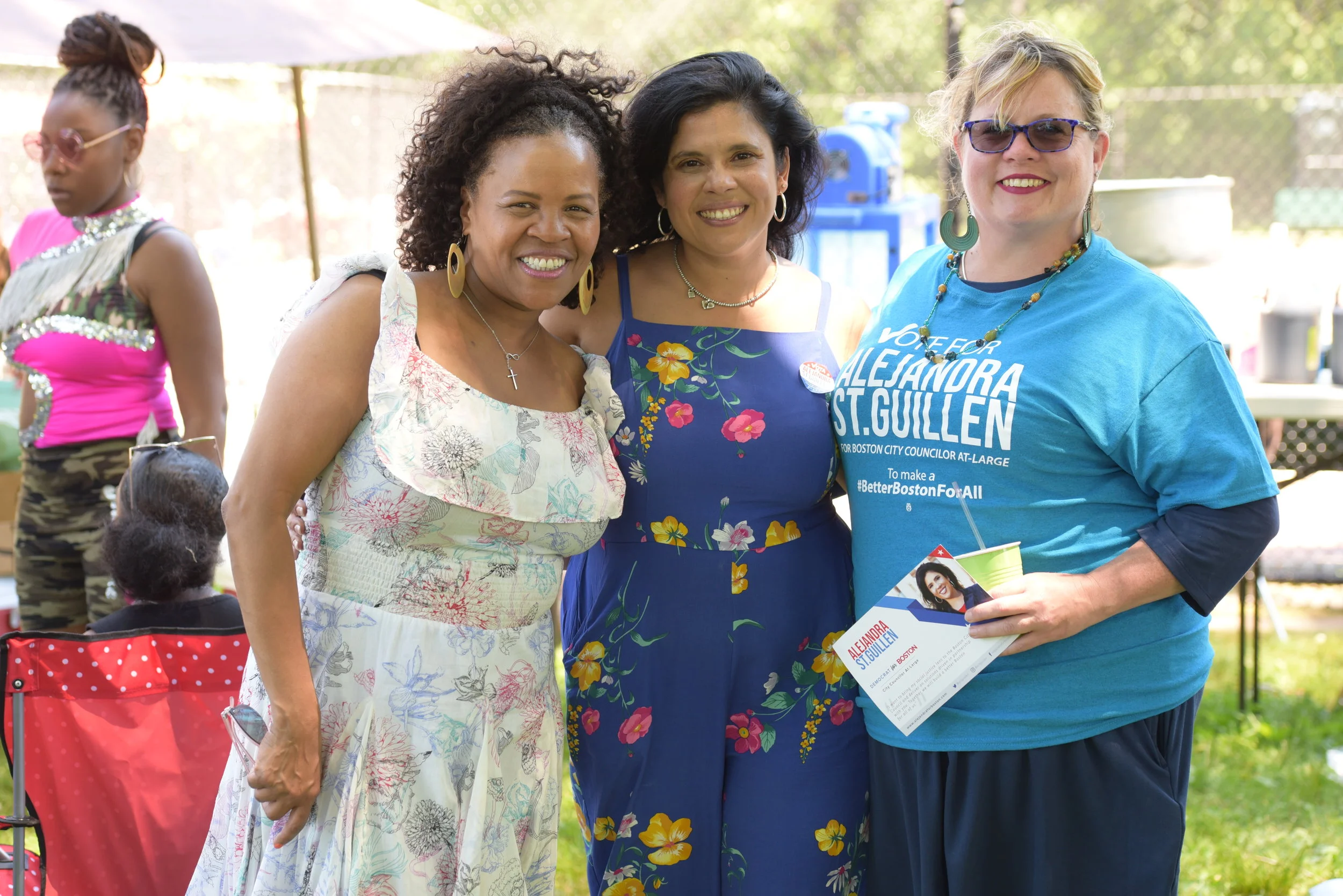 Boston City Councilor Kim Janey (District 7) and At Large Boston City Council Candidate Alejandra St. Guillen with local resident at Roxbury Annual Juneteenth Festival on June 15, 2019.