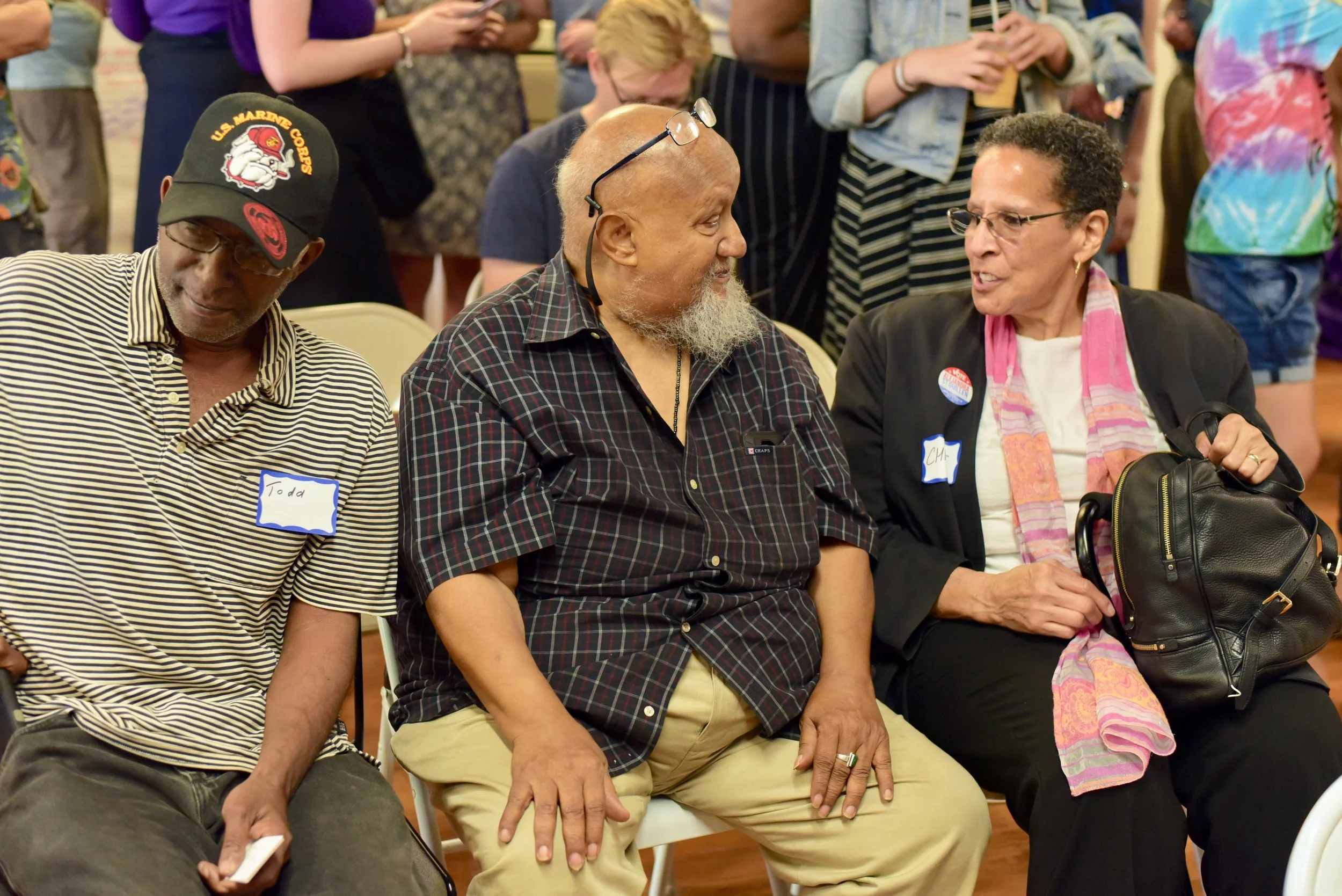 City residents chatting before the campaign office kick off event for Boston City Councilor Kim Janey (District 7) and At Large Boston City Council Candidate Alejandra St. Guillen.