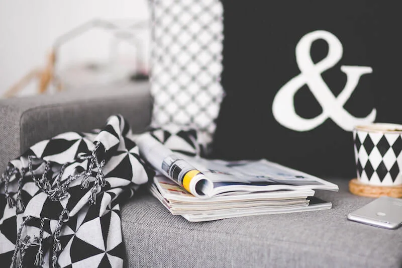 Using sentimental pieces like blankets, art, and mementos from travel to add style to your home