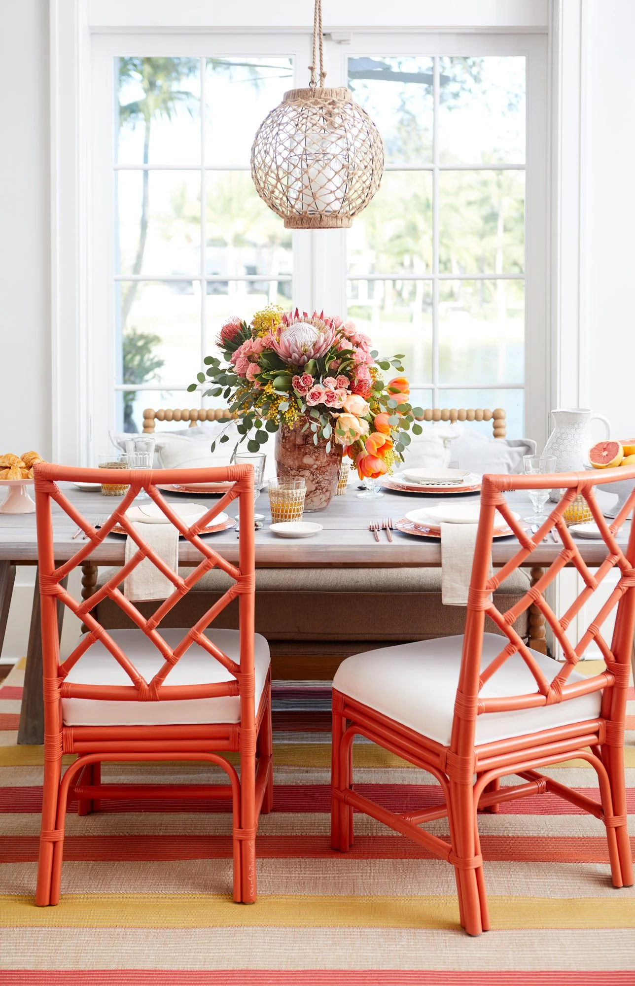 Adam Krauth Photo - Commercial Photography - Boston, MA - Still life - Interior photography. A scene of a dining table and chairs, with French doors. Bright and open space. 