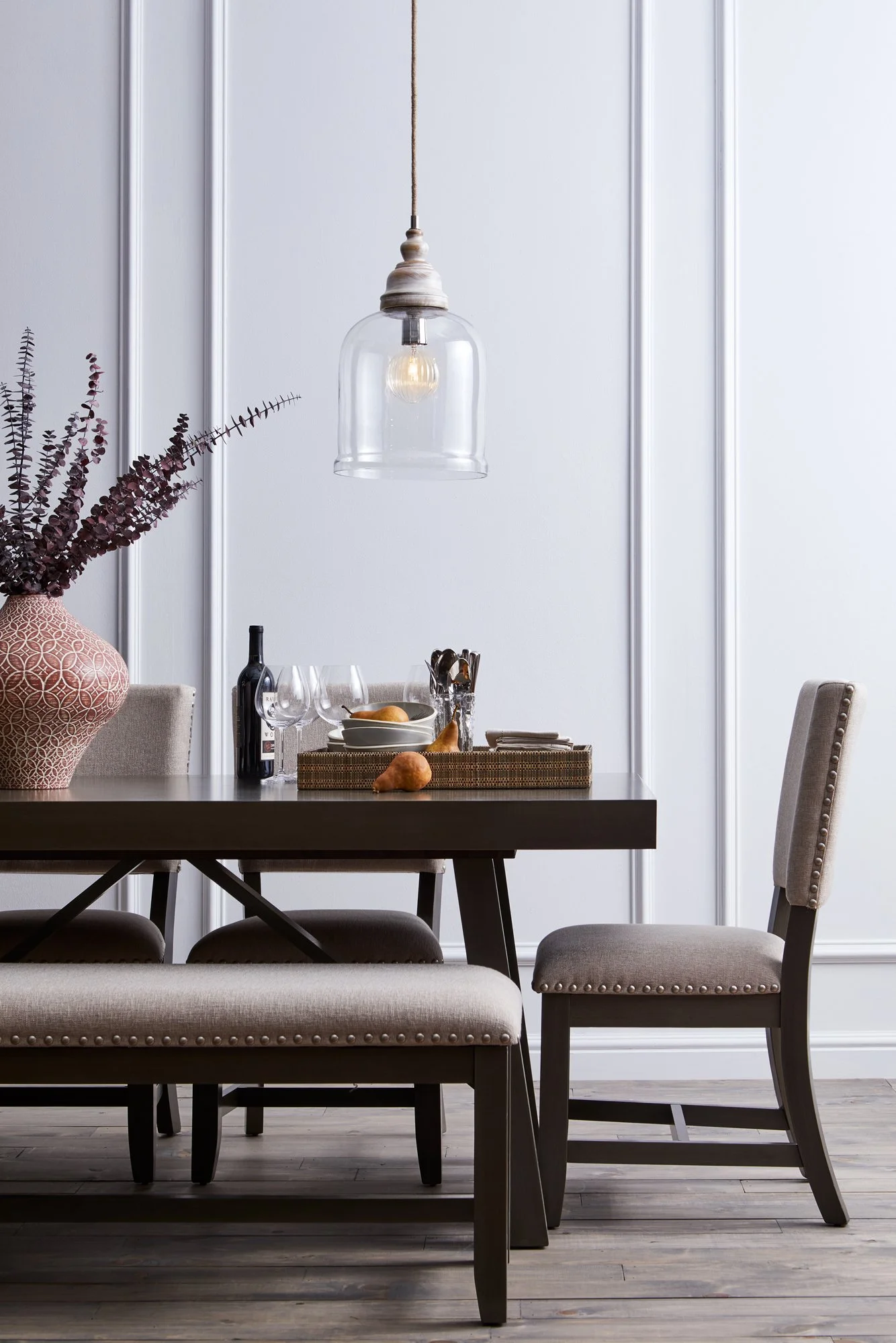 Adam Krauth Photo - Commercial Photography - Boston, MA - Still life - Interior photography. A scene of a dining room scene with a wooden table set with a tray of pears, wine, glasses, and cutlery. HomeGoods