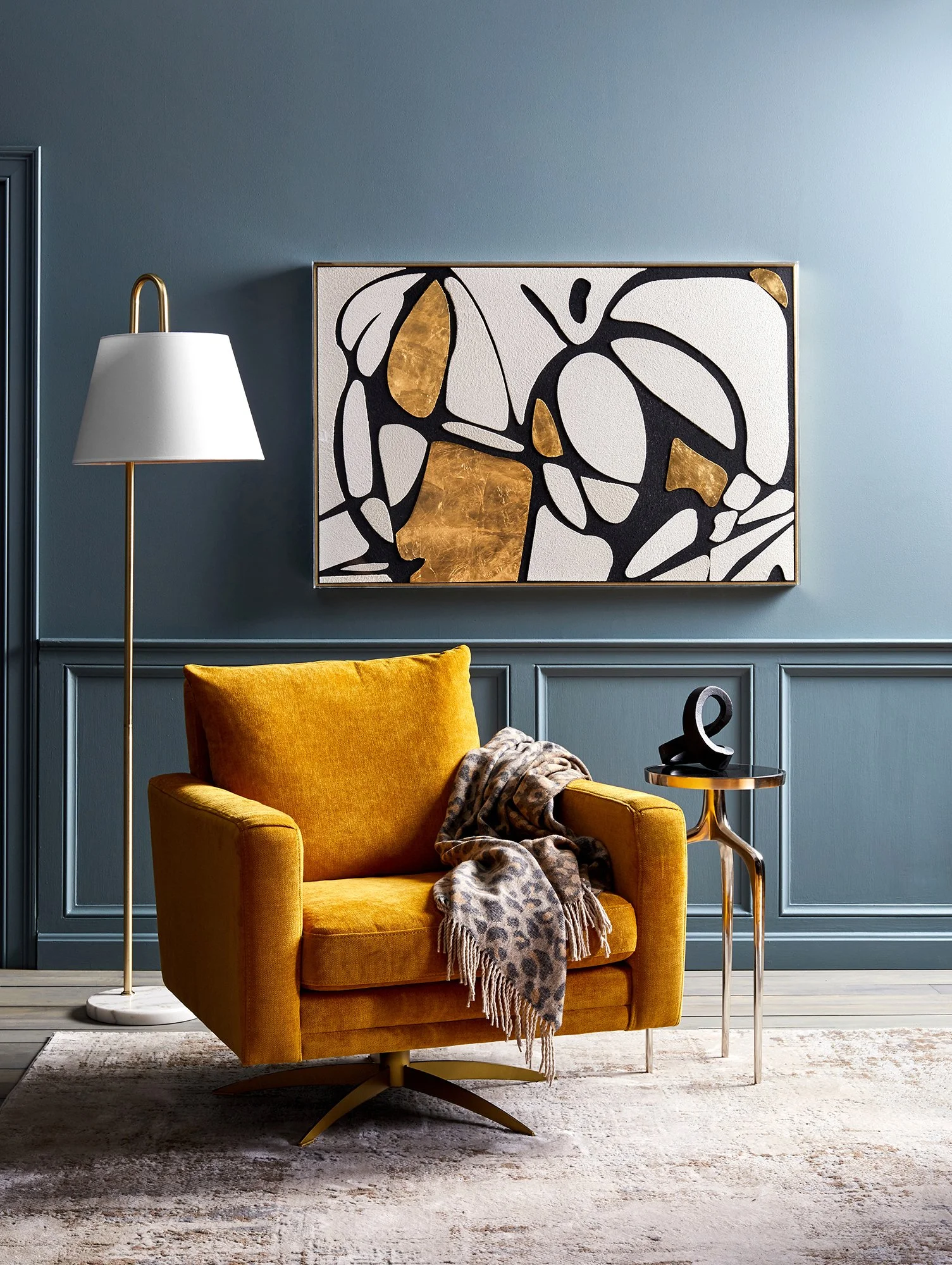Adam Krauth Photo - Commercial Photography - Boston, MA - Still life - Interior photography. A scene with a mustard yellow upholstered armchair, abstract art, and dynamic lighting. 