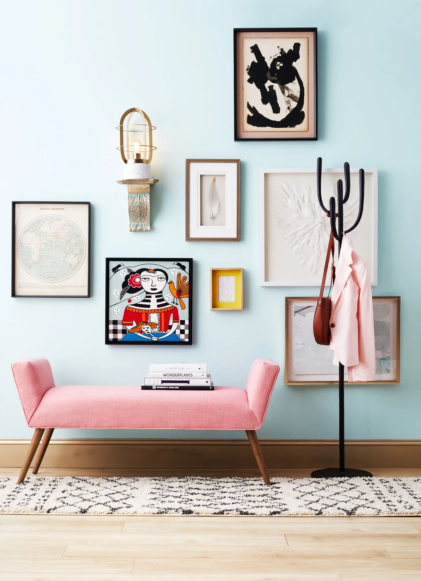 Adam Krauth Photo - Commercial Photography - Boston, MA - Still life - Interior photography. A scene with a pink chair and gallery style wall art. 