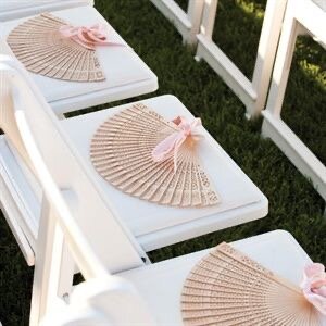 Provided wedding fans for guests to stay cool during the ceremony