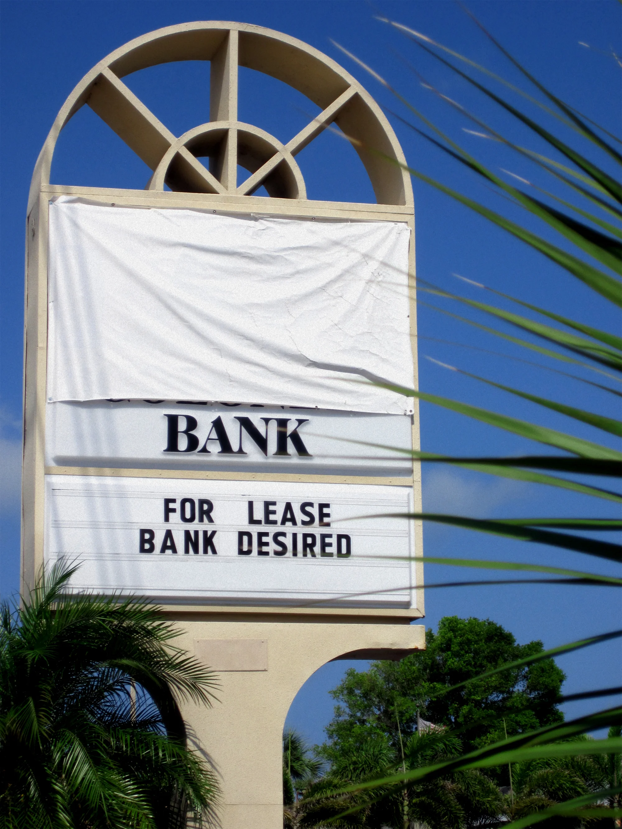 How do you weigh future market and branch investment against existing facility priorities?