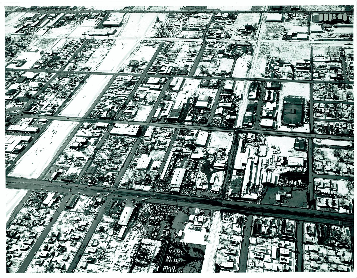 View of the industrial downtown area of South Salt Lake, during construction of I-80 in the 1960s.