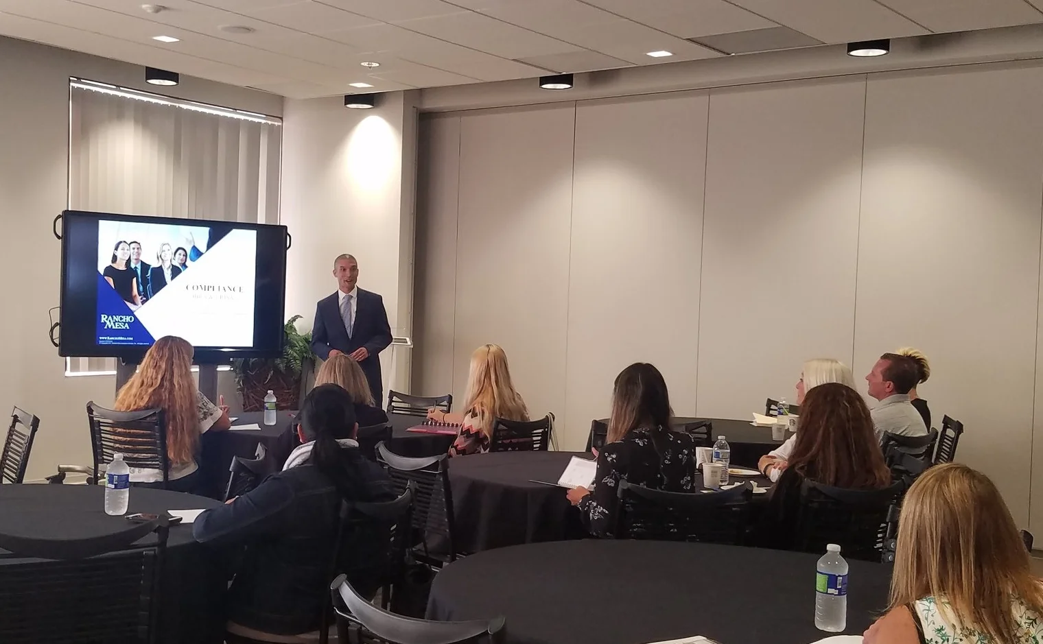 Shane Medlin from Rancho Mesa Insurance giving a presentation at the Employee Benefits Compliance workshop.