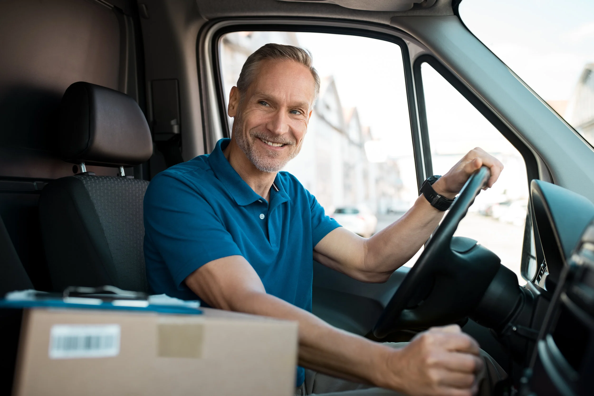 Man driving a van.
