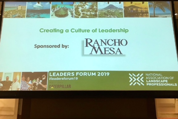 Leaders Forum giant screen with Rancho Mesa logo displayed as the sponsor