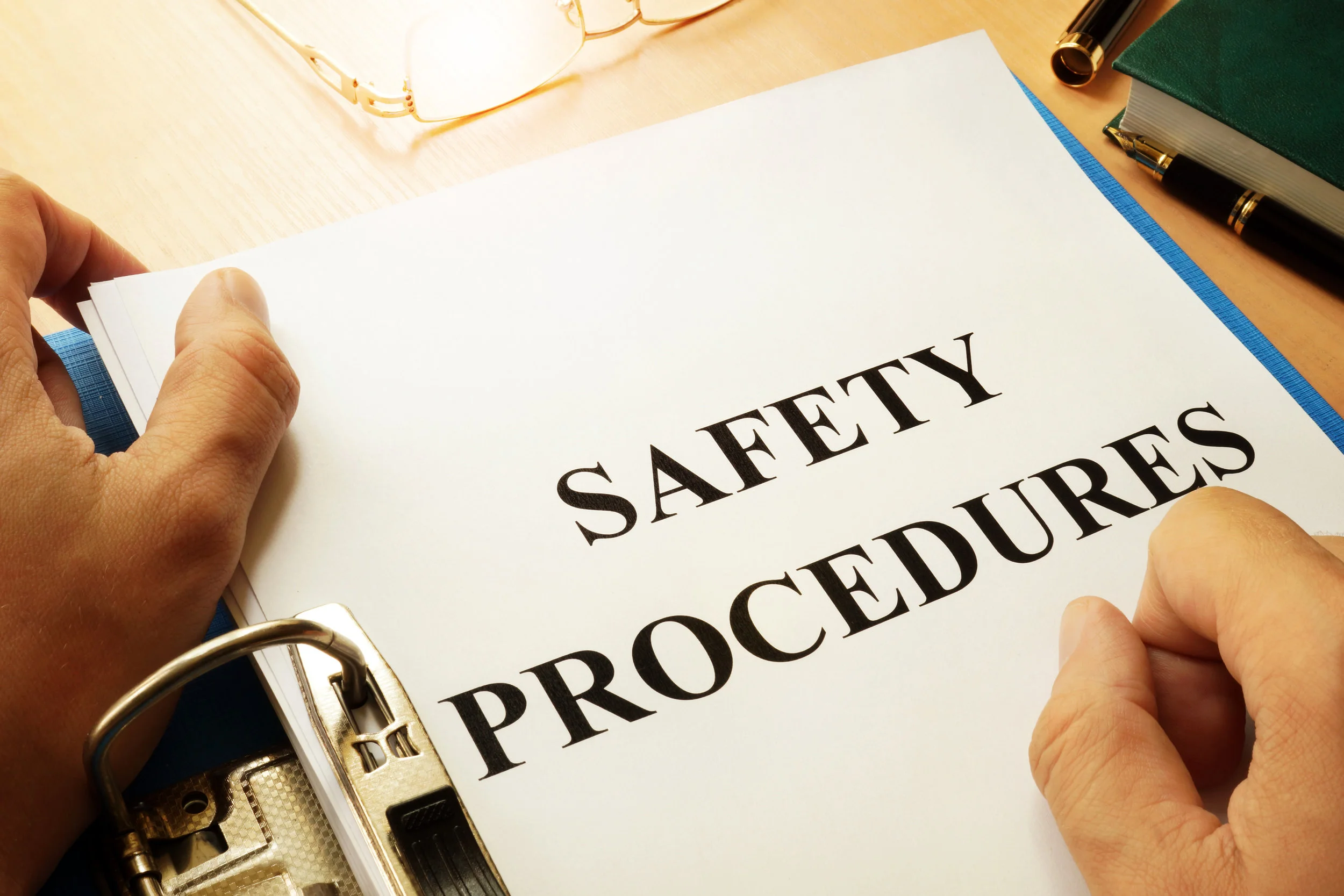 “Safety Procedures” typed on a page in a notebook.