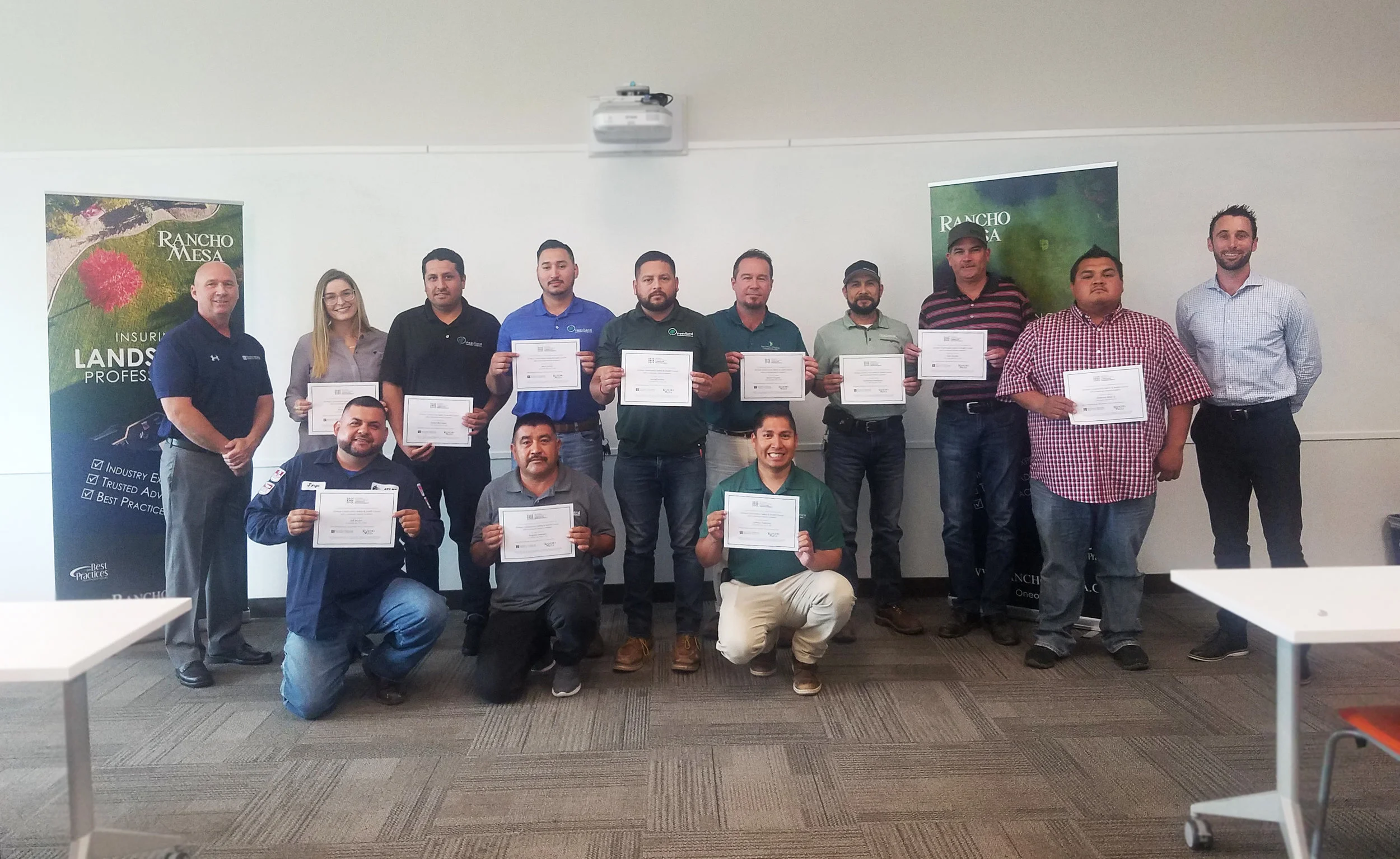 Attendees holding certificates after completion of the OSHA 10 Course for the Landscape Industry.