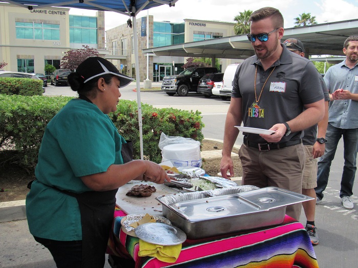 Picture of tacos being made for guests.